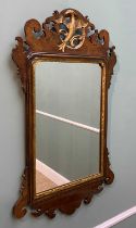 GEORGIAN STYLE PARCEL GILT MAHOGANY FRET MIRROR, pierced pediment with carved and gilt Ho-Ho bird