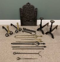 VINTAGE CAST IRON FIREBACK, two sets of Grate dogs and a mixed quantity of iron and brass fireirons,
