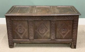 CARVED OAK COFFER, circa 1780, three panels, interior candle box and iron strap hinges, swirled