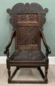 18TH CENTURY OAK WAINSCOTT ARMCHAIR circa 1790, scroll-carved crest and corbels to an inlaid