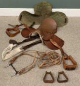 LEATHER PONY SADDLE, BRIDLE STRAP, REIGNS & TACK, 48 x 37cms the saddle Provenance: deceased