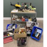 THREE RADIO CONTROLLED HELICOPTER MODELS & A LARGE QUANTITY OF ASSOCIATED EQUIPMENT including a