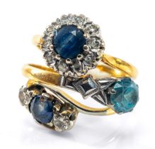 THREE GOLD RINGS comprising 18ct gold blue topaz ring, 18ct gold sapphire and diamond cluster
