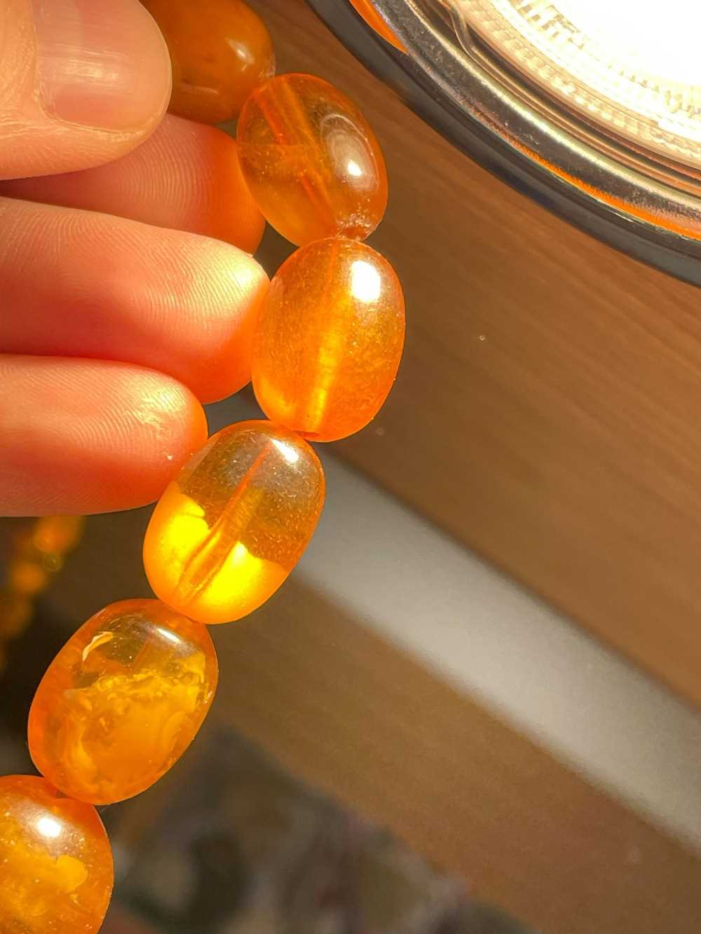 SINGLE STRAND AMBER BEAD NECKLACE, beads 13mm to 20mm, approx gross wt. 55gms - Image 9 of 13