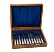 GEORGE V CASED SILVER FRUIT SET, Asprey, Sheffield 1914, for six place settings, with mother of