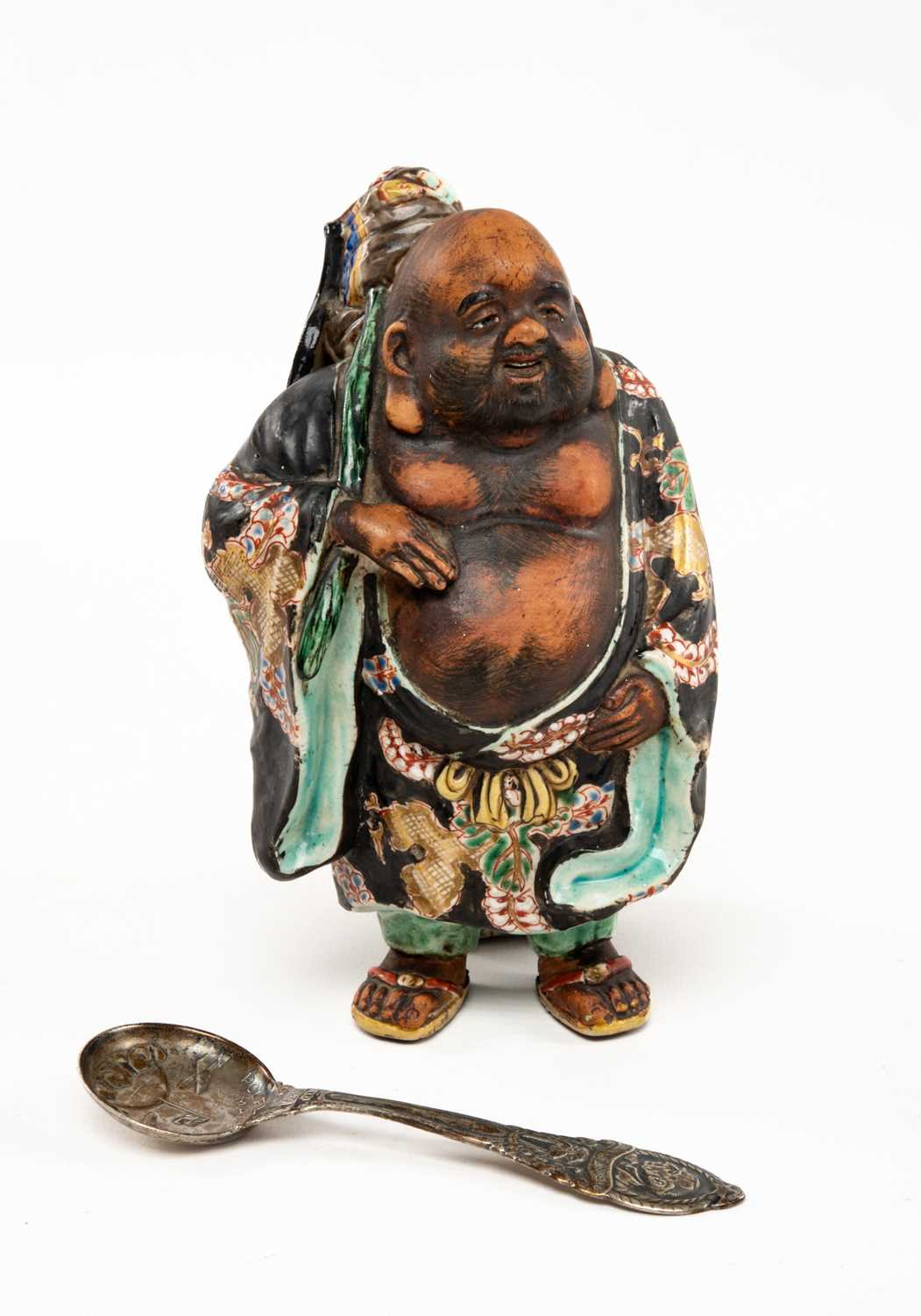 JAPANESE KUTANI PORCELAIN FIGURE OF HOTEI, 17cms h; together with Roald Amundsen 'Polflyvningen