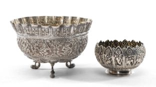 GROUP OF INDIAN SILVER comprising a Swami bowl with crimped rim, decorated with repousse floral