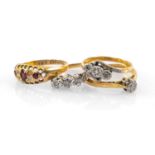 GOLD RINGS comprising four 18ct gold rings set with diamonds and garnets, 8.8gms gross (4)