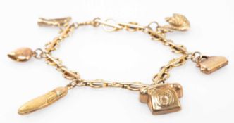 9CT GOLD CHARM BRACELET, with five 9ct gold charms and one yellow metal charm, including swan, harp,