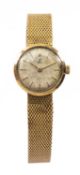 18CT GOLD EBEL LADIES' WRISTWATCH, the circular dial with baton hour markers, with integrated