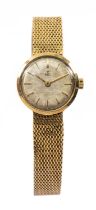 18CT GOLD EBEL LADIES' WRISTWATCH, the circular dial with baton hour markers, with integrated