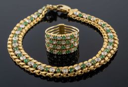 YELLOW METAL MATCHING BRACELET & RING set with white and green gem stones, both stamped '750', 16.