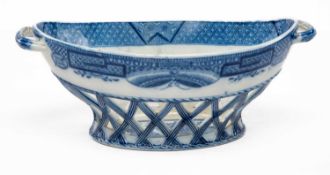 19TH C. PEARLWARE BLUE-PRINTED CHESTNUT BASKET, possibly Cambrian, oval form with waisted base,