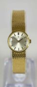 18CT GOLD LADIES' OMEGA BRACELET WATCH, c. 1965, manual wind movement with signed silvered dial,