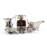 GROUP OF SILVER comprising small silver trophy cup on stand, silver pot bellied jug, silver and