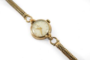 9CT GOLD OMEGA LADY'S WRISTWATCH the circular dial with baton hour markers, 9ct gold bracelet, 19.