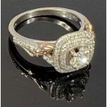 CLOGAU 9CT WELSH GOLD DIAMOND CLUSTER RING 0.25ct central stone, claw mounted to shouldered square