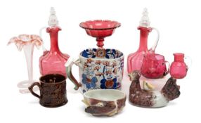 VICTORIAN COLOURED GLASS & POTTERY, comprising pair cranberry claret decanters and clear stoppers,