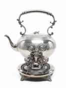 VICTORIAN ELECTROPLATED KETTLE ON STAND, engine turned decoration and stags mask, C-scroll and fruit