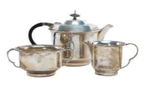 GEORGE VI SILVER THREE-PIECE TEA SET, Sheffield 1946, circular form with angled stepped top, total