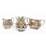 FOUR SILVER VESSELS, including small bowl with four shell-form legs and engraved presentation