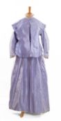 LAVENDER SILK DRESS, comprising sleeved jacket with pearl/bead fringed striped and lace-trimmed bib,