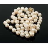 SINGLE STRAND CULTURED PEARL LONG NECKLACE, with 9ct gold reeded ball clasp, pearls appr. 10mm