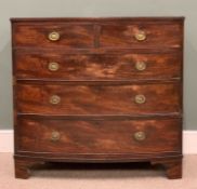 REGENCY MAHOGANY BOW FRONT CHEST, two short, three long oak lined drawers, cast brass oval