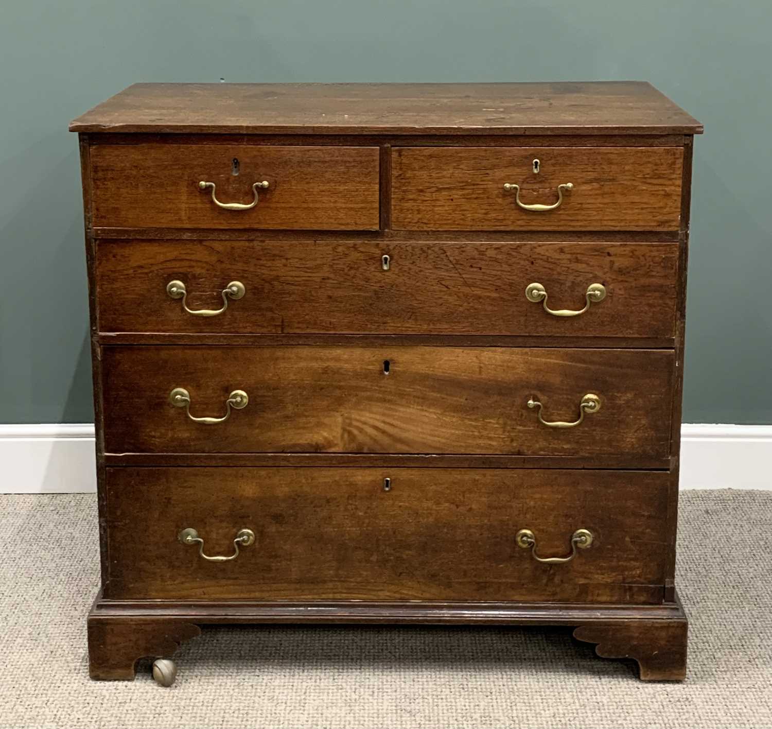 GEORGE IV OAK CHEST, two short, three long pine lined drawers, replacement brass pommels, swan