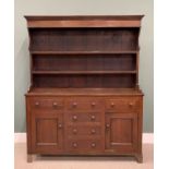 NORTH WALES OAK DRESSER circa 1870, shaped sided plate rack, shelves, wide boarded back, panel sided