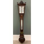 GEORGE V MAHOGANY STICK BAROMETER WITH THERMOMETER, carved details throughout, white enamel