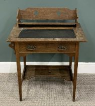 ARTS AND CRAFTS STYLE OAK DESK, book rack top with stylized pierced detail, inset writing surface to