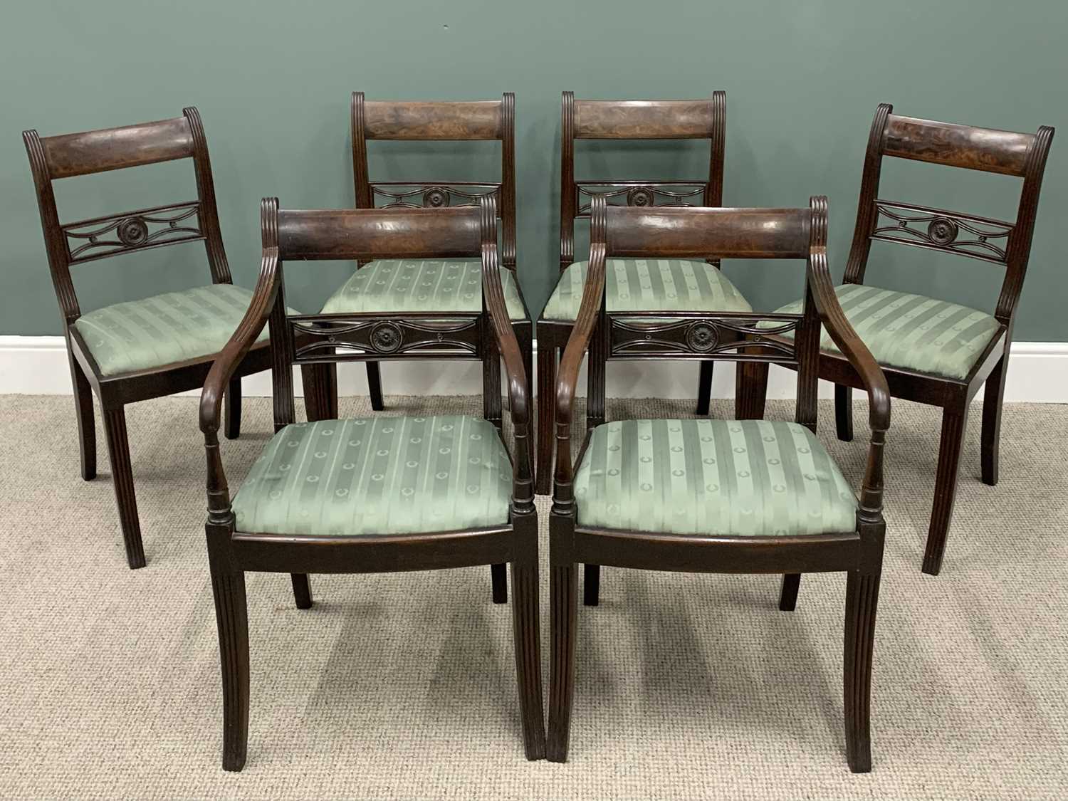 SET OF SIX REGENCY MAHOGANY DINING CHAIRS (4 + 2), slightly curved backs, carved roundel and pierced
