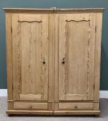 CONTINENTAL STRIPPED PINE DOUBLE WARDROBE, twin shaped panel doors, turned wood knobs, twin lower