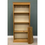 TALL LIGHT WOOD MODERN BOOKCASE, top light apertures, six interior adjustable shelves, plinth