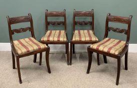 SET OF FOUR REGENCY MAHOGANY SABRE LEG CHAIRS, slightly curved backs, scroll and leaf carved