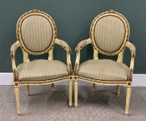 PAIR OF PARIS-STYLE SALON ARMCHAIRS, oval cameo backs, swept arms, striped upholstery, carved detail
