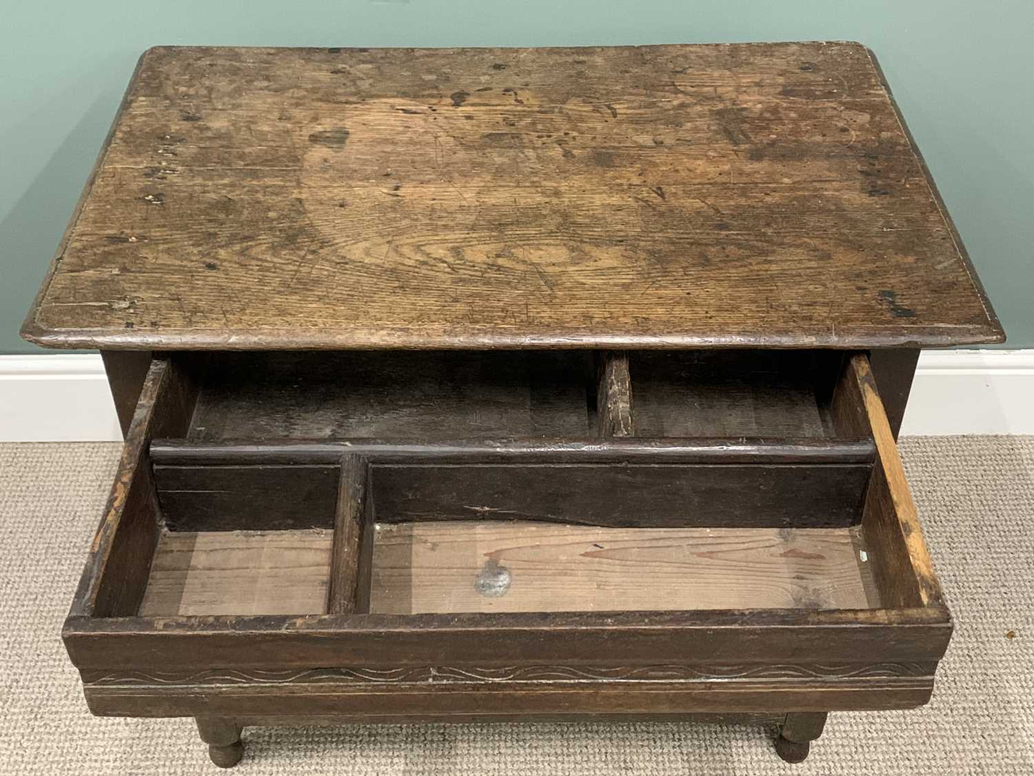 ANTIQUE OAK SINGLE DRAWER TABLE circa 1800, planked top, moulded edge, carved drawer front, peg - Image 4 of 4