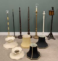 SEVEN VARIOUS STANDARD LAMPS, to include an oak barley twist example, circular base, turned bun