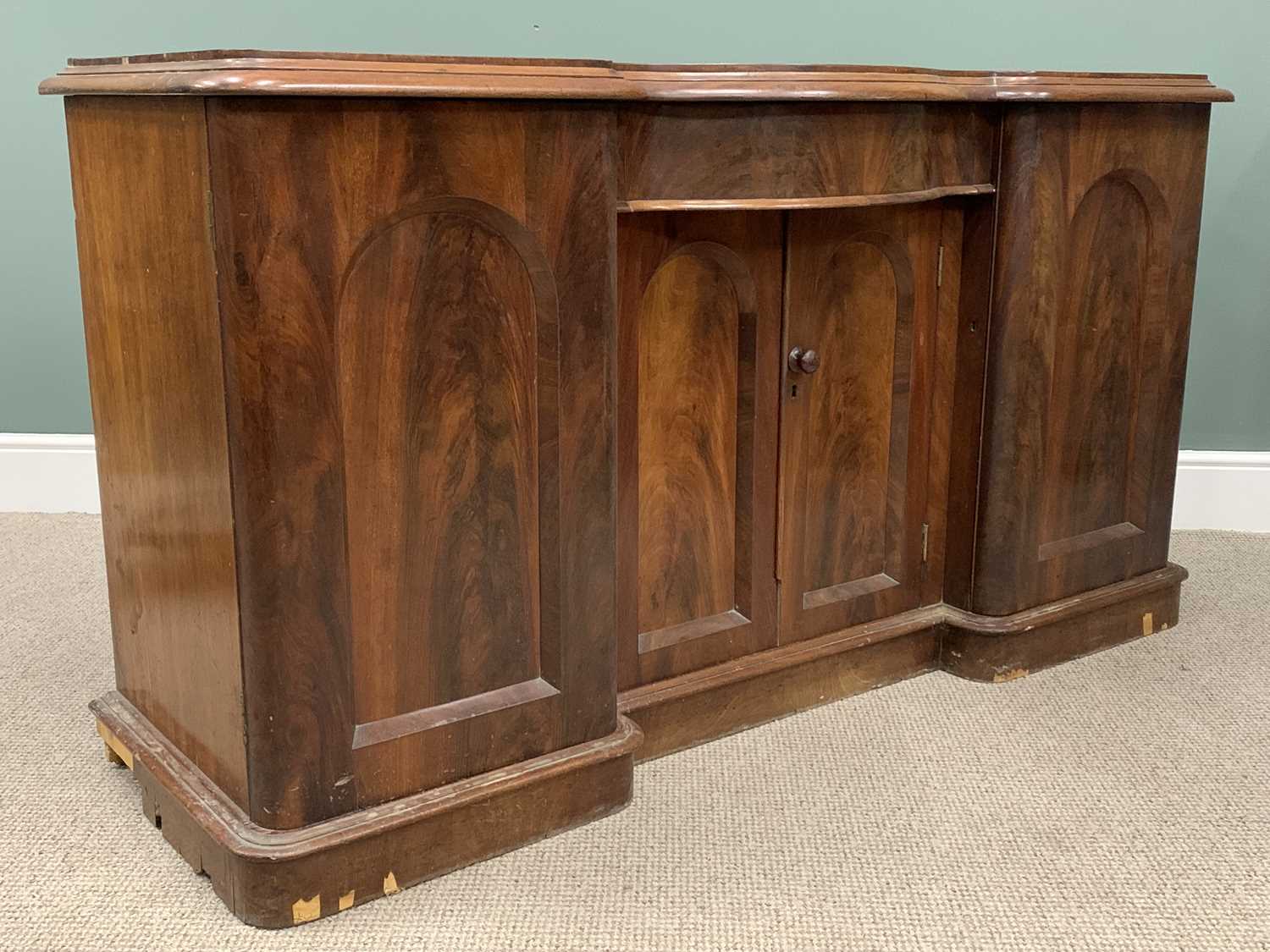 VICTORIAN MAHOGANY SERPENTINE SIDEBOARD BASE, shaped moulded edge top, central frieze drawer, twin - Image 4 of 5