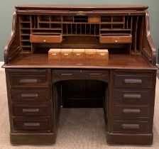 OAK ROLL TOP DESK circa 1900, tambour fall front, interior drawer and pigeonhole arrangement,