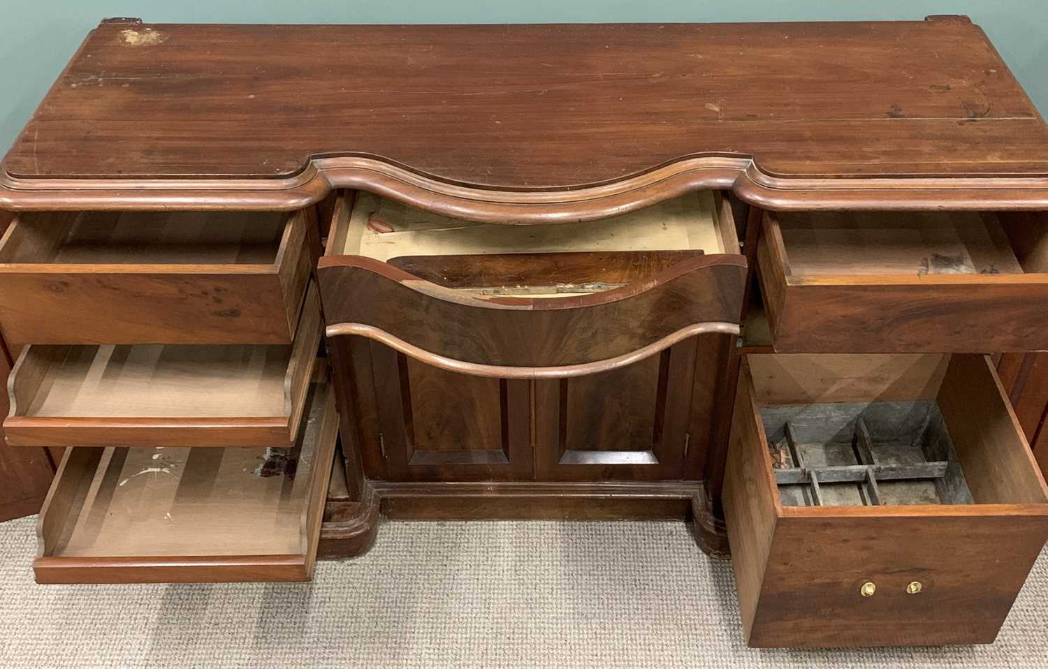 VICTORIAN MAHOGANY SERPENTINE SIDEBOARD BASE, shaped moulded edge top, central frieze drawer, twin - Image 3 of 5