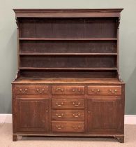 NORTH WALES OAK DRESSER circa 1840, wide boarded back three shelf rack, panel sided peg joined base,