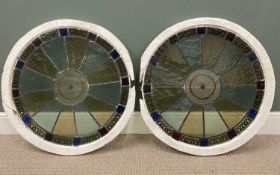 TWO CIRCULAR FRAMED STAINED GLASS LEADED WINDOWS, 82cms diam Provenance: private collection Conwy