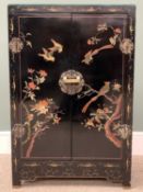JAPANESE TWO DOOR SIDE CABINET, black lacquered, carved painted/lacquered bird and floral detail,