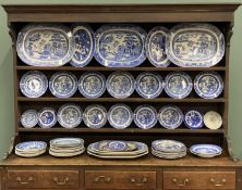 55 PIECE HARLEQUIN 'WILLOW' PATTERN POTTERY DRESSER SET, to include nine various platters, 45.5 x