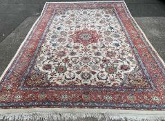 LARGE EASTERN STYLE RUG, cream central block, colourful floral repeating pattern, red central