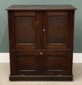 CARVED HARDWOOD STORAGE CUPBOARD, leaf/rabbit top and front panels detail, twin cupboard doors,