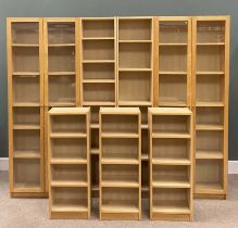 MODERN BOOKCASES comprising one pair with twin glazed doors, adjustable interior shelves, 203cms (