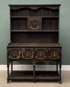 JACOBEAN STYLE OAK SIDEBOARD, central covered two-shelf rack, twin base drawers, brass drop handles,